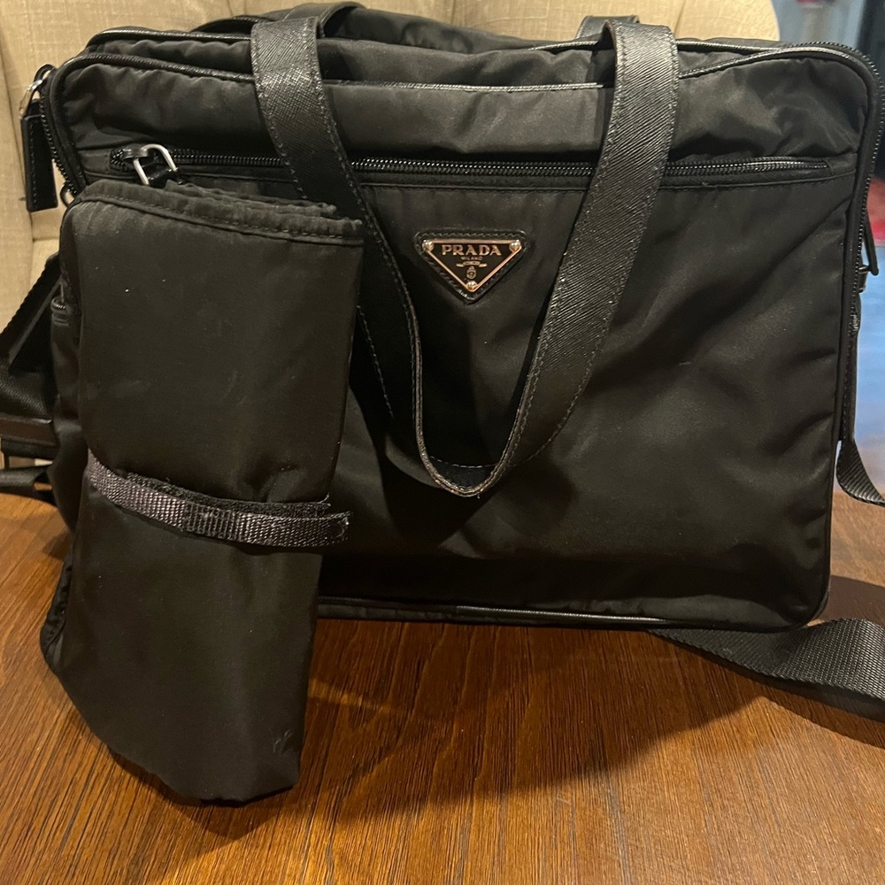 Prada nylon diaper bag and changing pad.